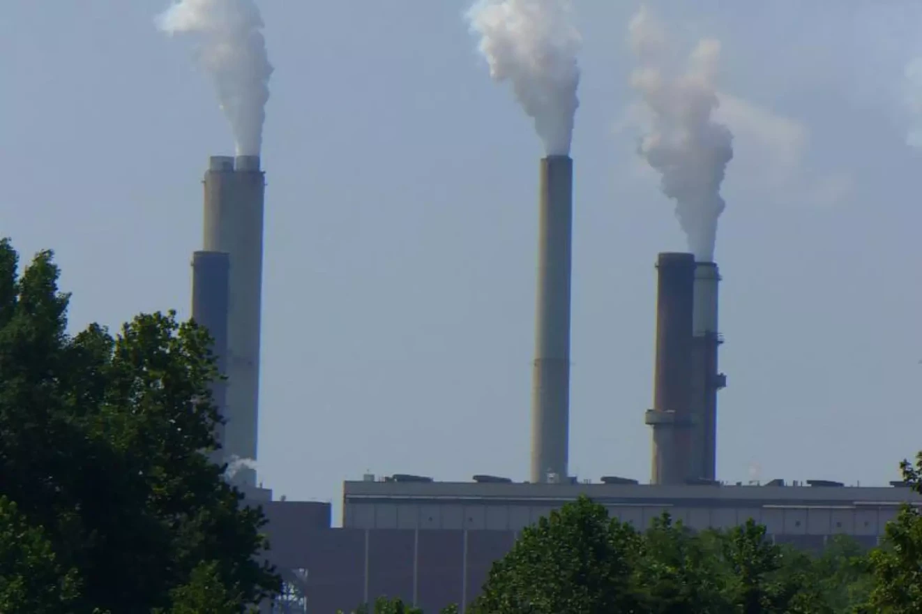 Smoke stacks at a power plant.